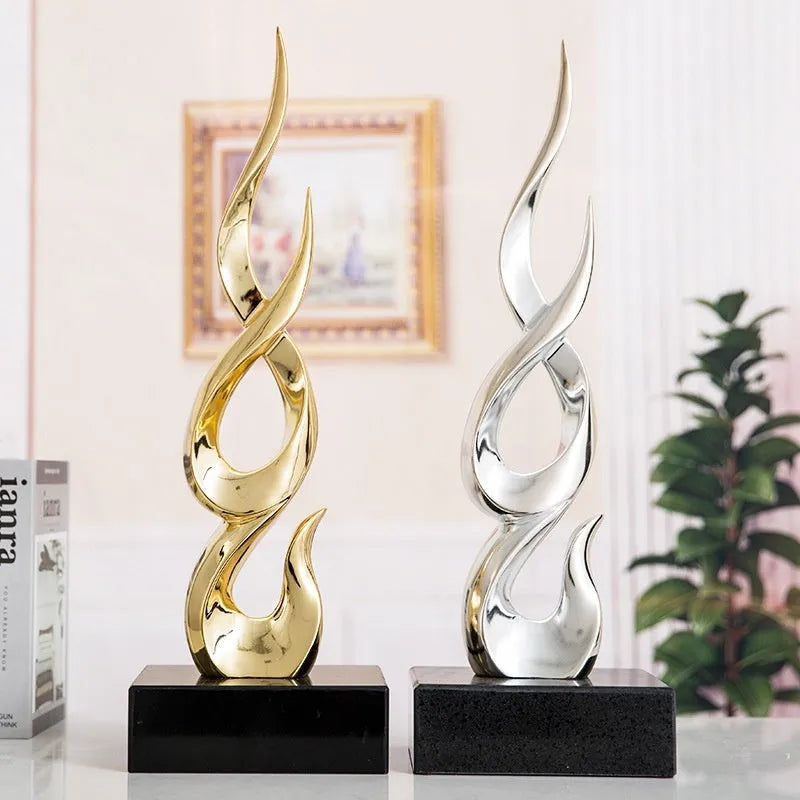 High-rise resin decoration crafts in gold and silver colours with modern simple design
