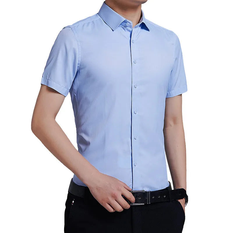 Men's non-iron short sleeve casual shirt in light blue, loose fit, cotton blend, front view
