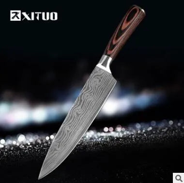 Kitchen knife set with Damascus pattern blades and coloured wood handles on display