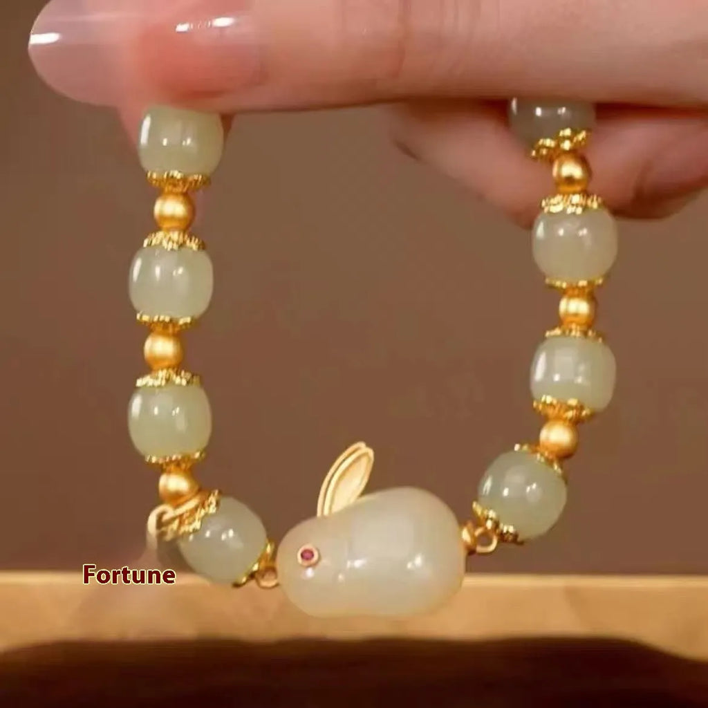 Green jade hare bracelet for women with Chinese style zodiac animal design and lily decorations