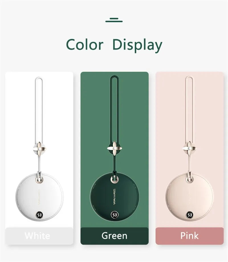 Green, pink, or white square 5000mAh hand warmer power bank with digital display next to charging cable.