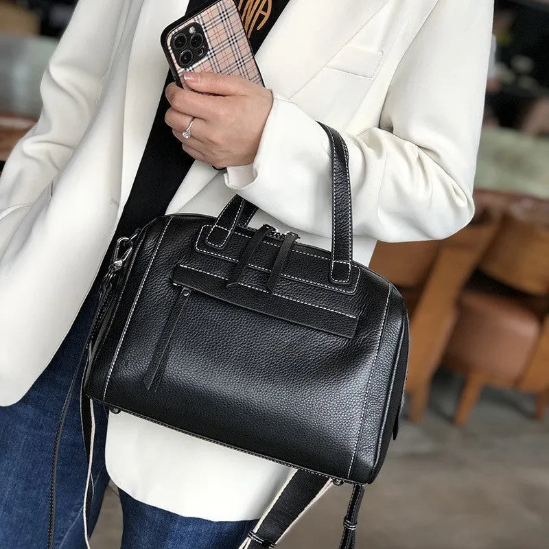 Genuine leather shoulder messenger bag with lychee pattern texture in horizontal square shape showing interior organisation compartments