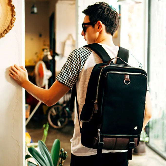 Men's modern backpack in Oxford cloth shown in Army Green colour, displaying its large capacity and Korean style design.