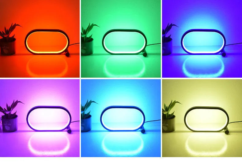 USB plug-in oval acrylic touch lamp with dimmable LED, metal body, on a bedside table