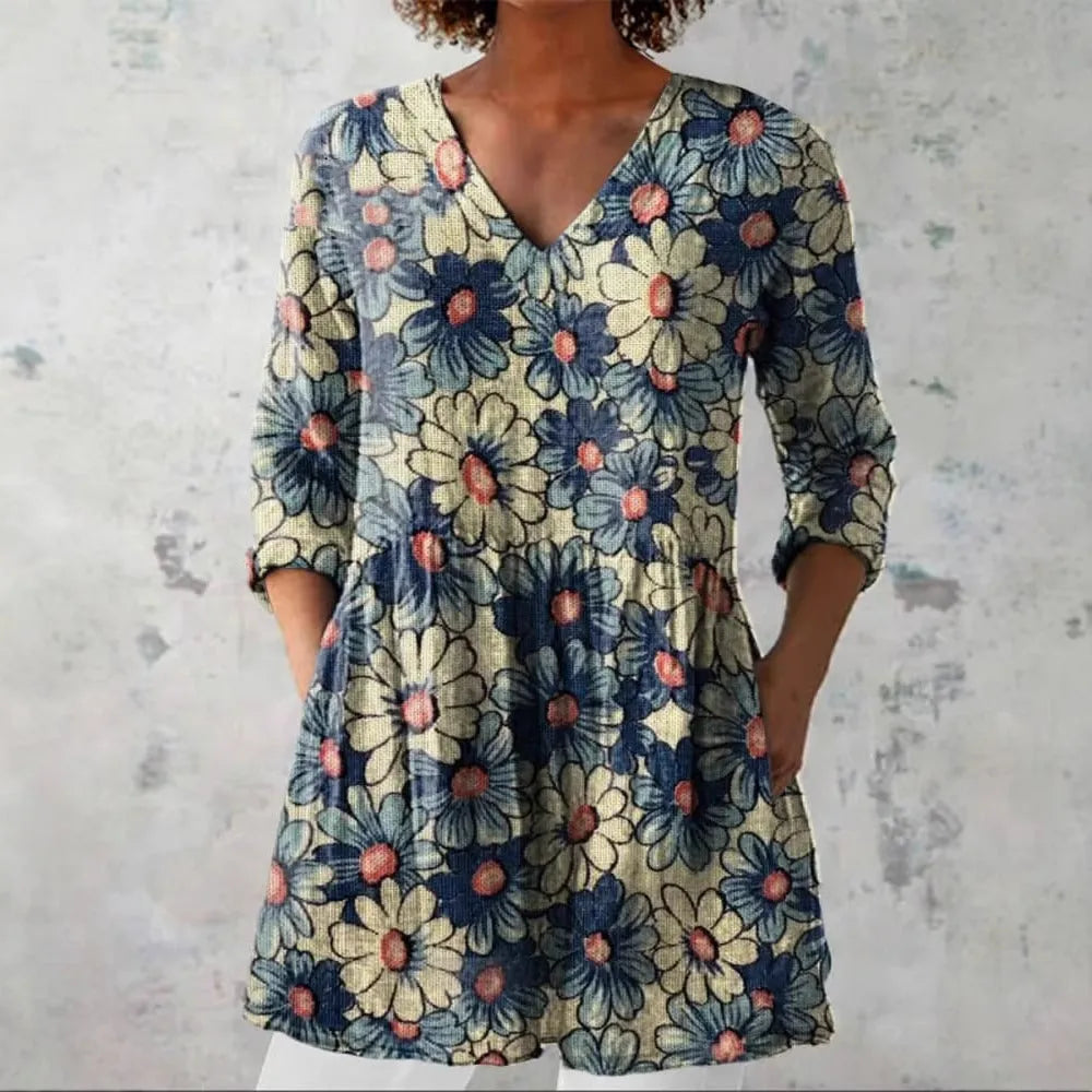 Women's retro-style slim fit long-sleeved top with a printed pattern, shown in a colour option.
