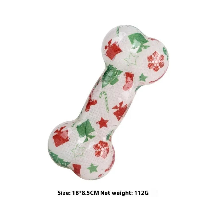 Printed bone-shaped dog toy with squeaker in seasonal Christmas red and Halloween pumpkin colours
