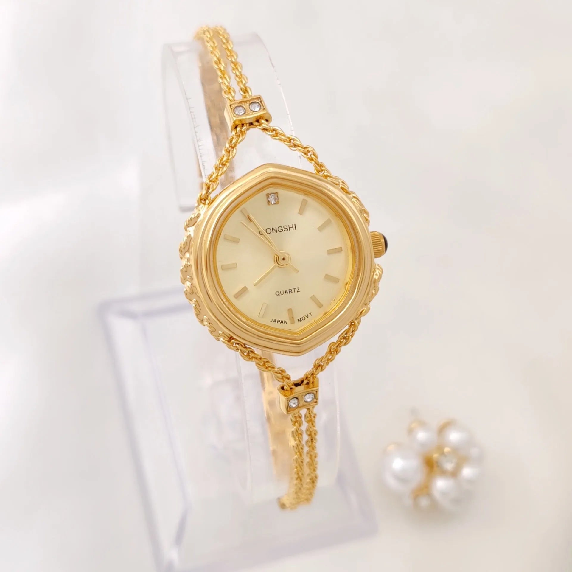 Women's Mori style quartz watch with 25mm dial, mineral glass face, and metal chain strap