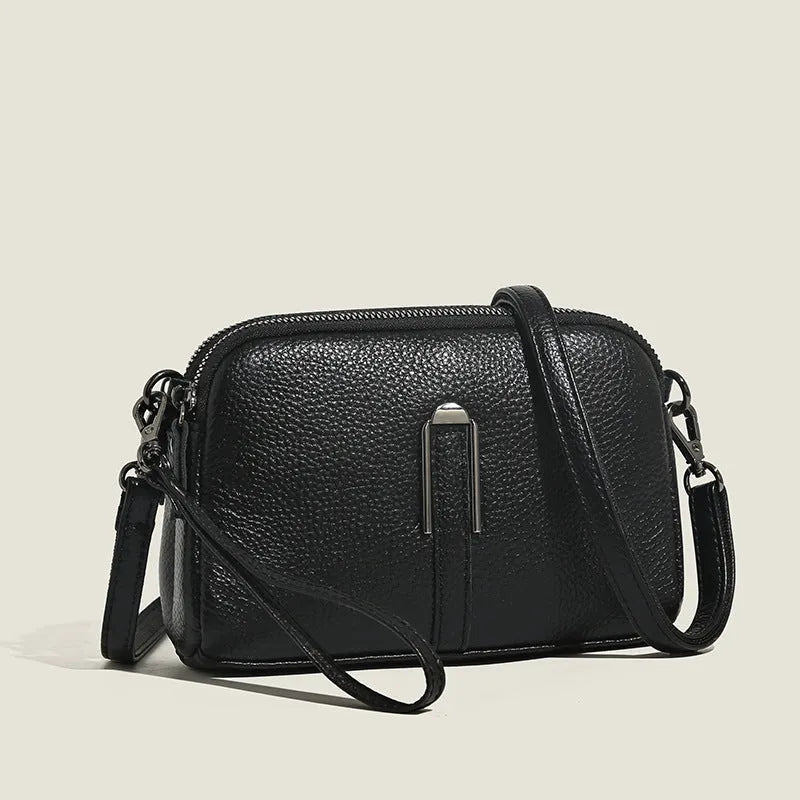 Genuine leather women's square shoulder bag in dark khaki colour, showing structured horizontal shape.