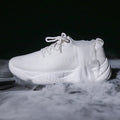 White thick-soled women's casual shoes with woven upper and front strap.