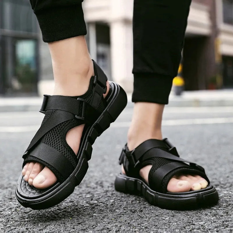 Men's black Velcro open toe beach sandals on a light surface, sizes 39-44