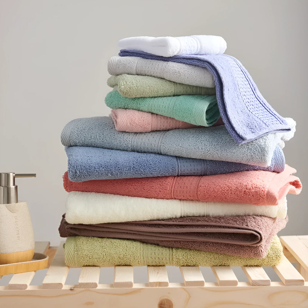 Pure cotton 3-piece towel set with square towel 33cm, hand towel 32x73cm, and bath towel 70x140cm in assorted colours