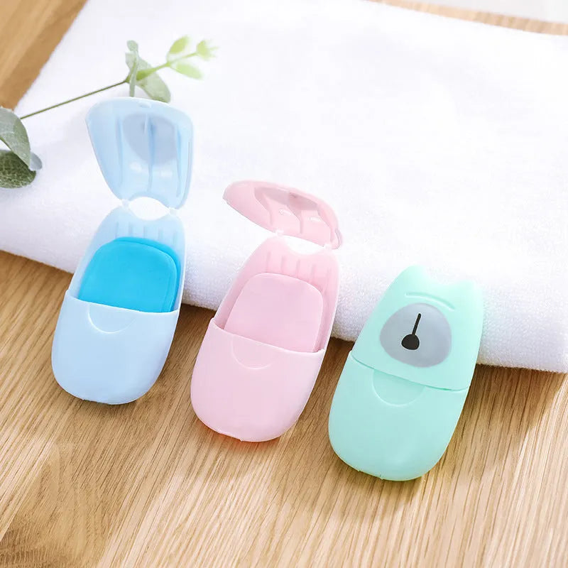 Pack of 50 biodegradable soap paper sheets in pink, blue, and green colours, 8x4.5cm size, for travel and outdoor hand cleaning