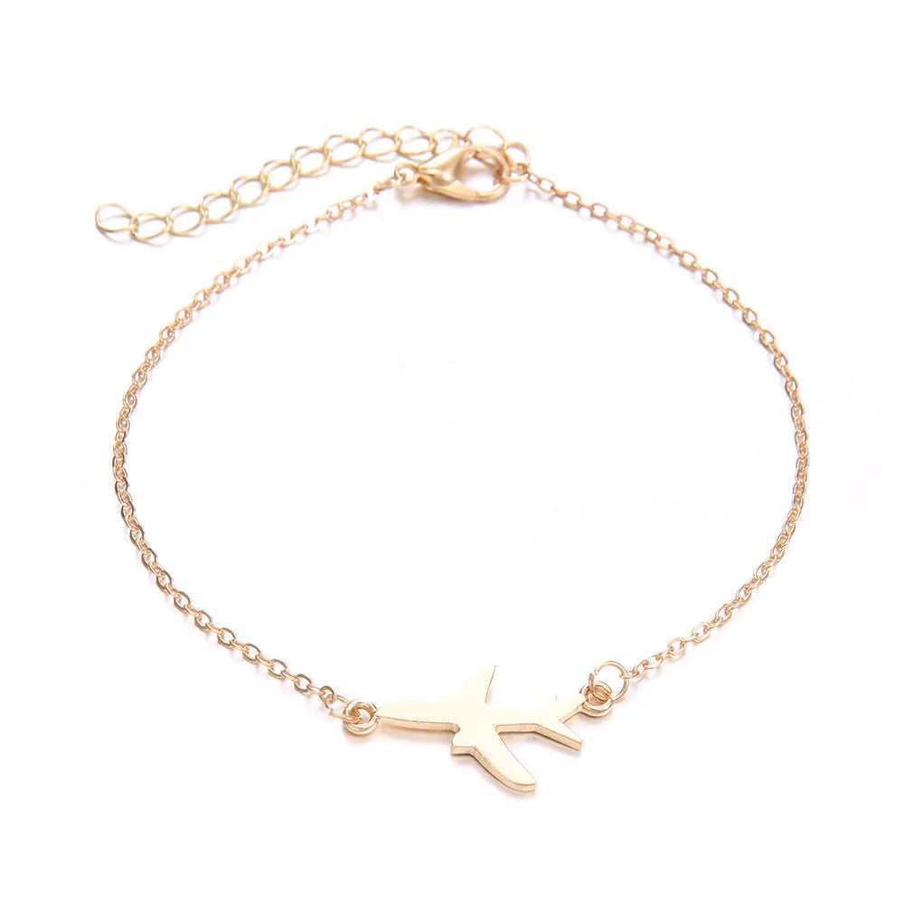 Set of three bohemian-style women's bracelets with aircraft map designs on heart-shaped alloy charms