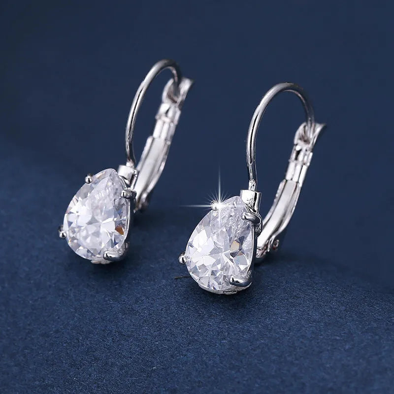 Women's drop-shaped copper earrings with gemstone inlay in gold or platinum colour options