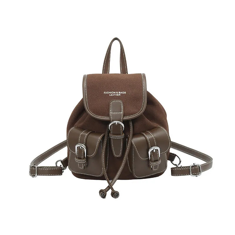 Urban simplicity backpack in black with clamshell opening and contrast stitching on front