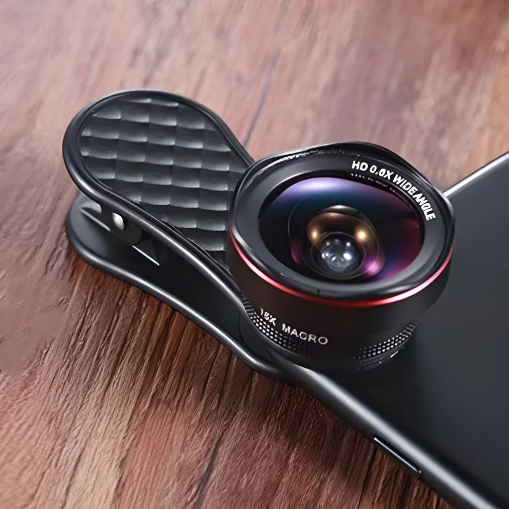 Black wide-angle and macro mobile phone lenses with clip and storage box on a table