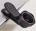 Black wide-angle and macro mobile phone lenses with clip and storage box on a table