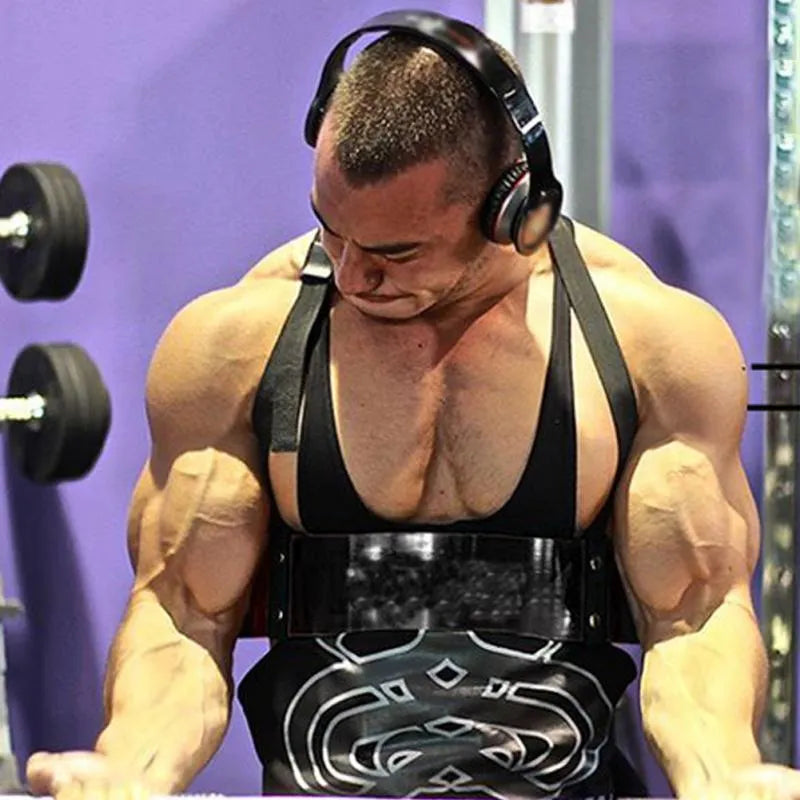 Black aluminium biceps training board with nylon straps and sponge elbow pads on flat surface