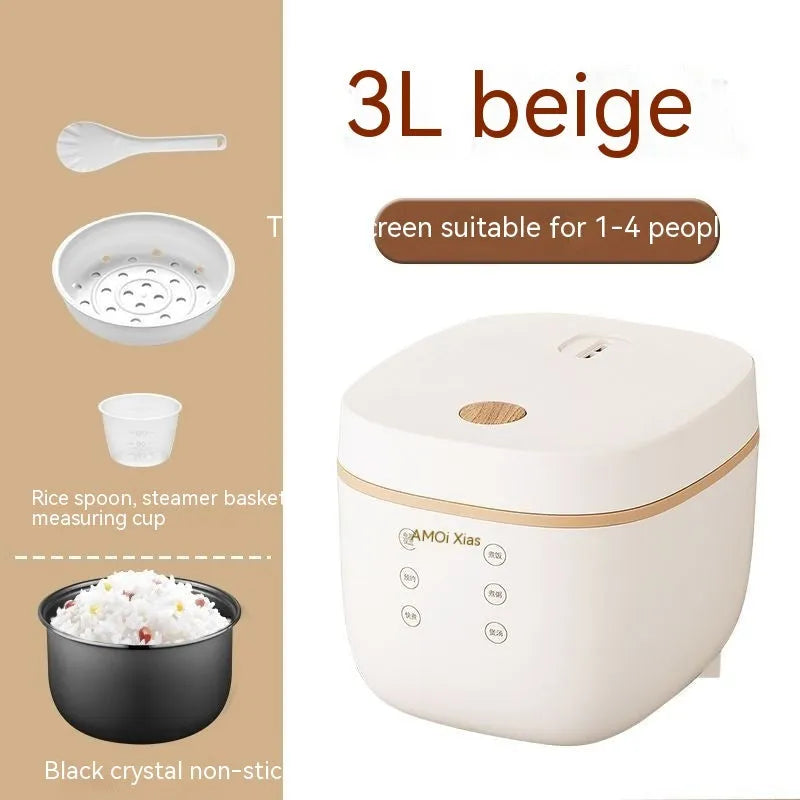 White or beige 3L rice cooker with black inner pot, rice scoop, measuring cup and steamer basket