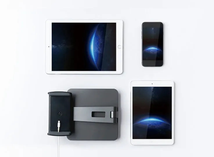 Folding aluminium desktop stand holding a tablet, showing its 360-degree rotation hinge and black/silver colour options.