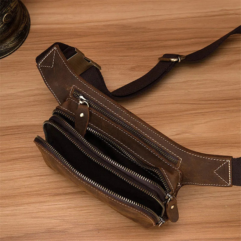 Brown cowhide leather men's sports waist bag with a pull-closure.