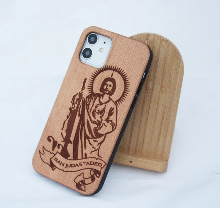 Wooden mobile phone case with solid wood back panel and TPU bumper, showing elephant print design for iPhone