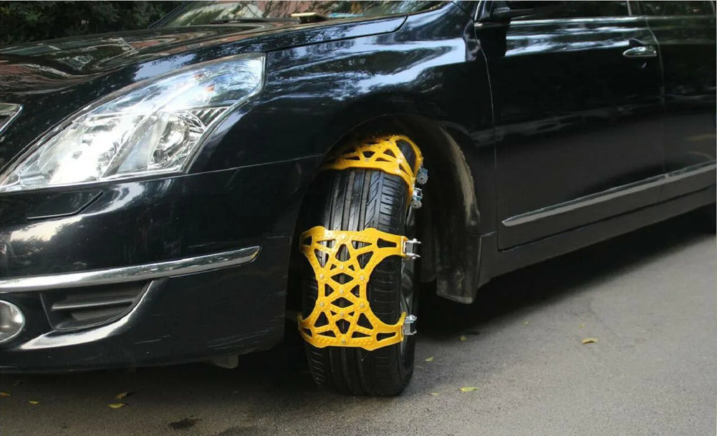 Yellow universal snow chain made from widened thickened TPU with steel nails for non-slip winter traction