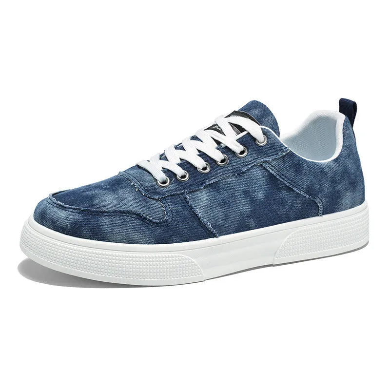 Men's low-top canvas platform sneakers in blue with lace-up front and sewn thread detailing