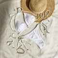Women's halter bikini with front lace-up design in polyester fabric for swimming