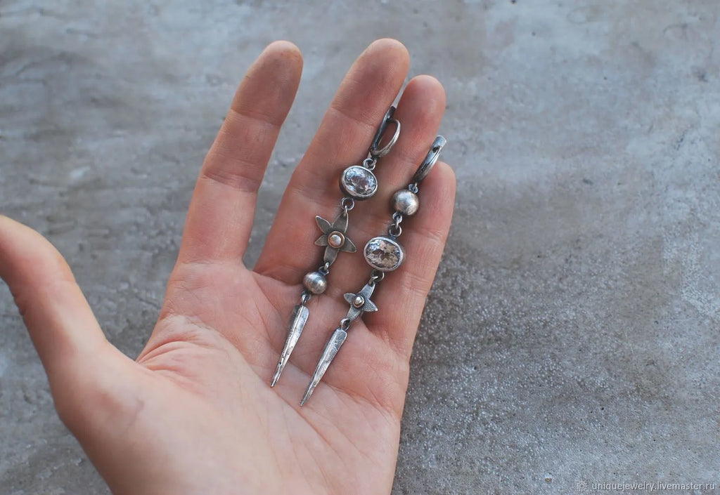 XINGX geometric antique silver-plated rhinestone pendant earrings showing long drop design