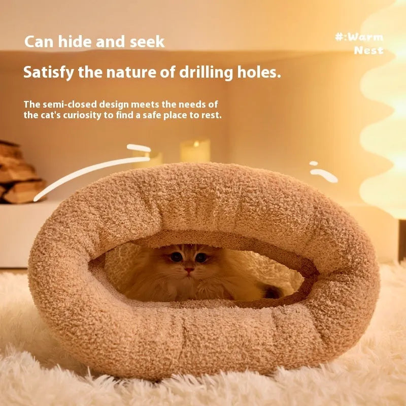 Brown semi-enclosed cat sleeping bag with lambswool lining on wooden floor