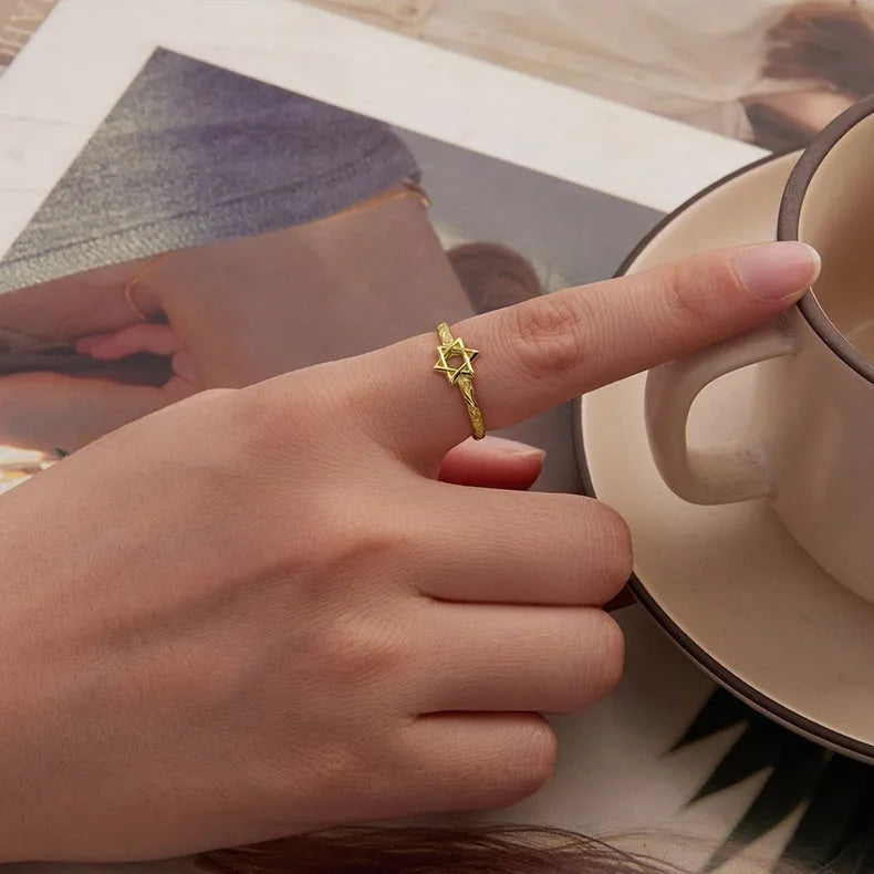 Silver star open ring with six-pointed star shape and retro finish, shown in silver or gold colour option
