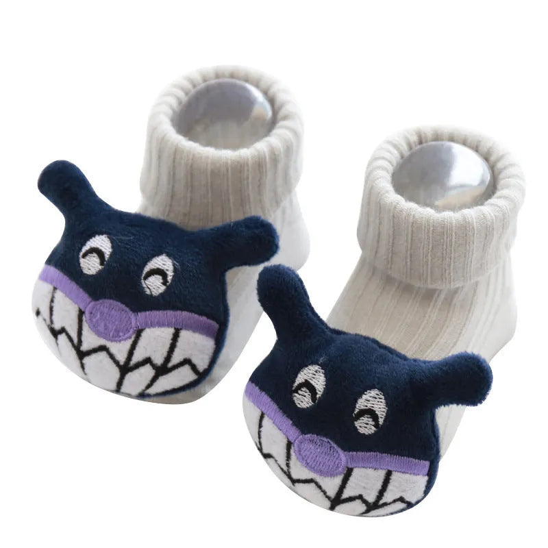 Cotton baby socks with non-slip soles in multiple designs including bows, stars, and animal prints.