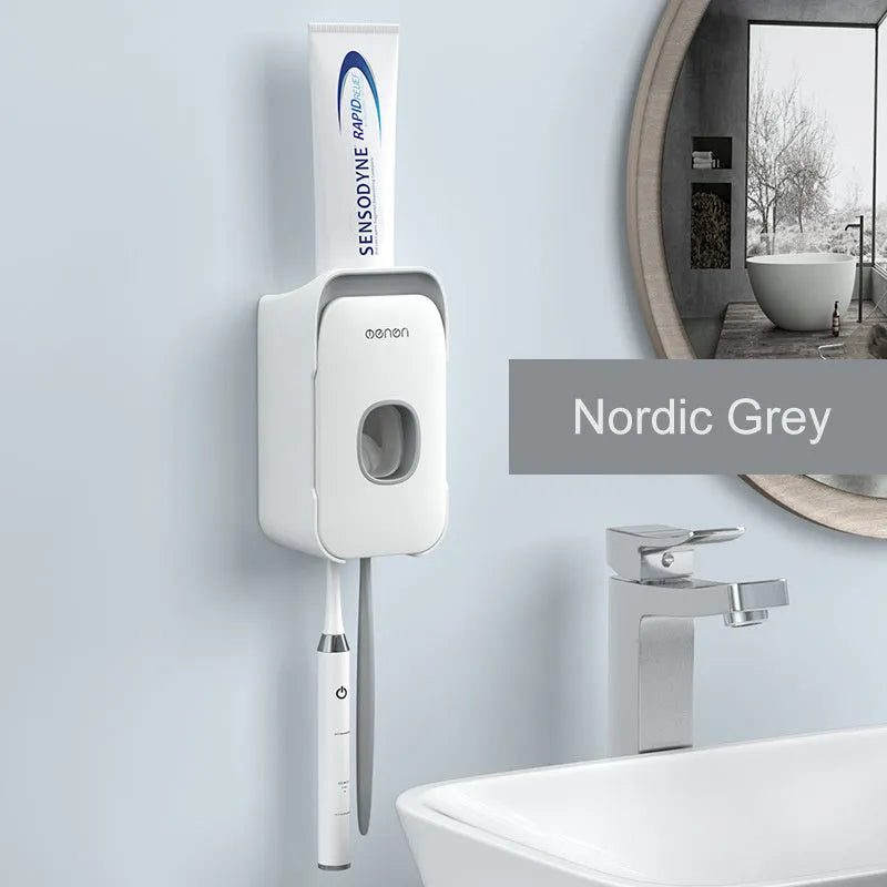 Automatic toothpaste dispenser mounted on bathroom wall in blue colour with touchless sensor