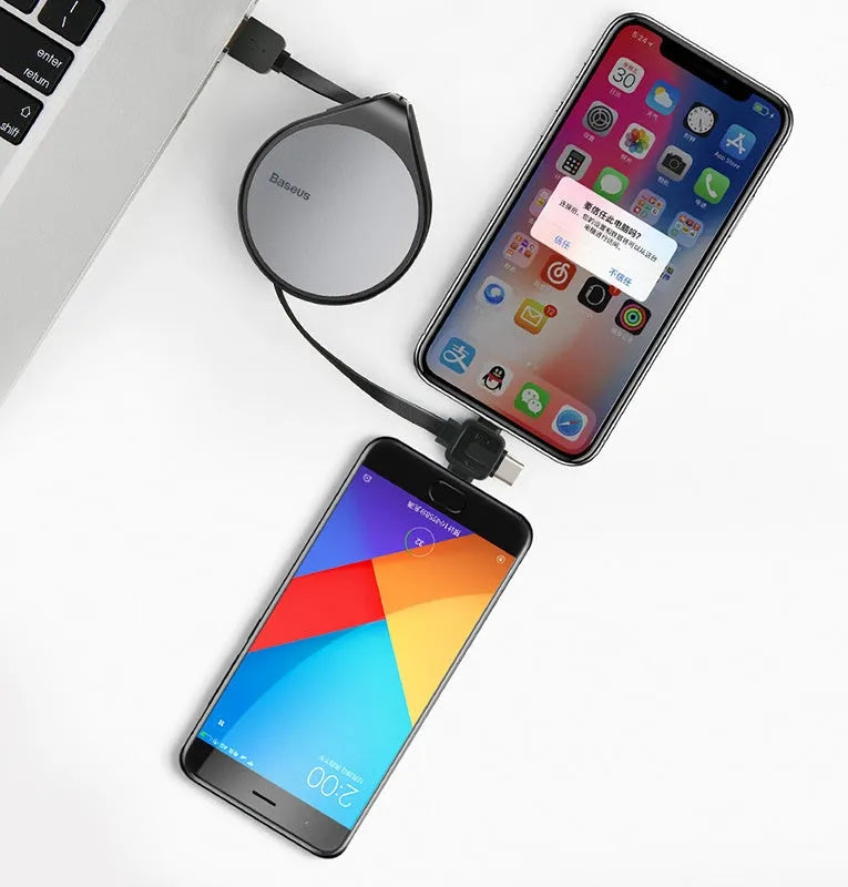 Telescopic three-in-one charging cable extended to show USB-C, Lightning and Micro-USB connectors