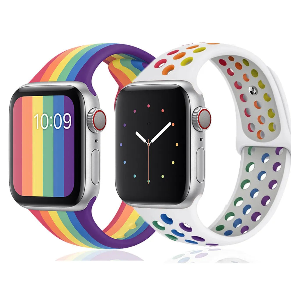 Black silicone sports wristband with a single buckle, shown next to white and rainbow colour options.