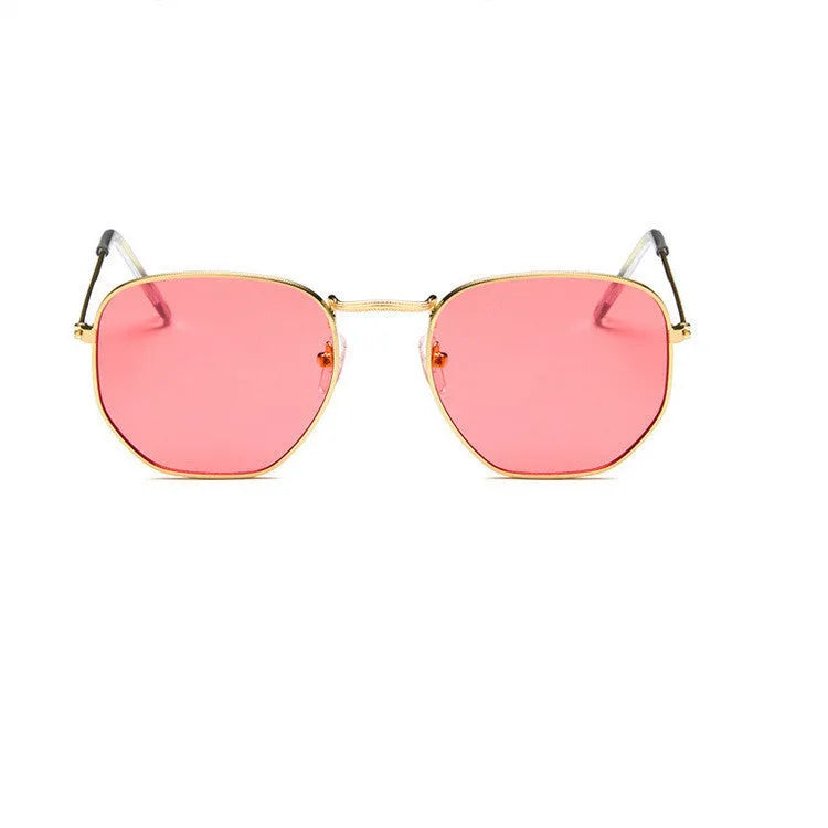 Retro street sunglasses with gold metal frame and transparent red resin lenses