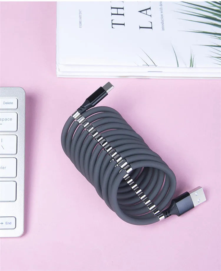 Black magnetic charging cable with aluminium connectors compatible with Apple iPhone and Android devices