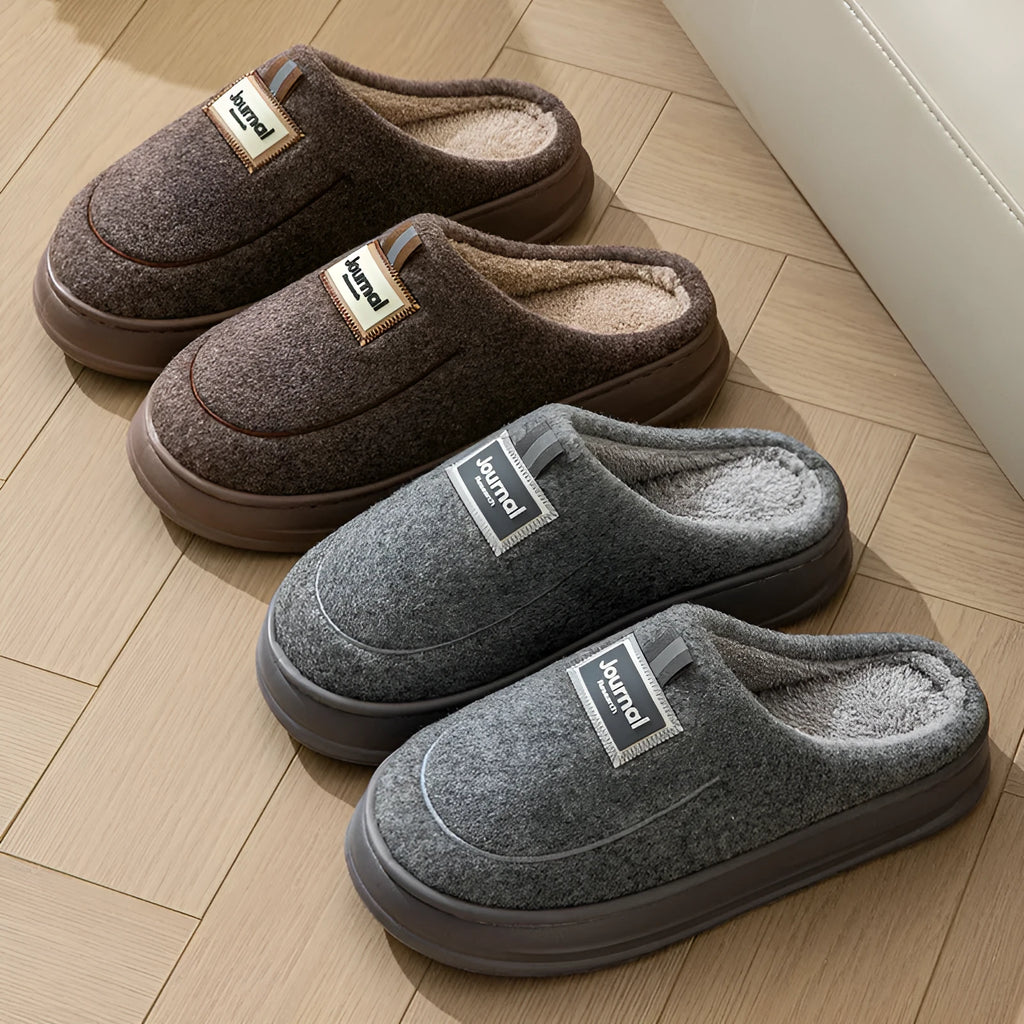 Men's grey suede slippers with thickened bottom and EVA sole showing extended sizing label