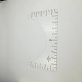 Transparent acrylic sewing ruler with 10x6 inch dimensions for fabric measurement