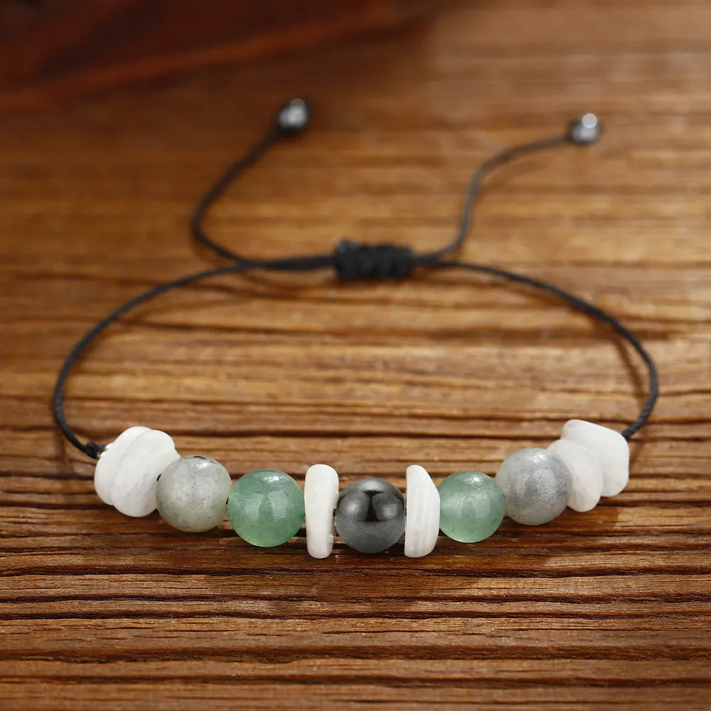 Women's geometric stone bead bracelet with colourful beads in geometric pattern on wrist
