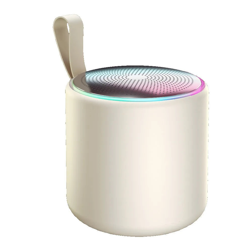 Bluetooth mini portable speaker in beige, front view, with compact design and visible speaker grille