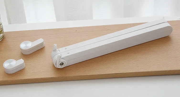 White Whale Race adjustable laptop stand with cooling radiator base for Apple MacBook.