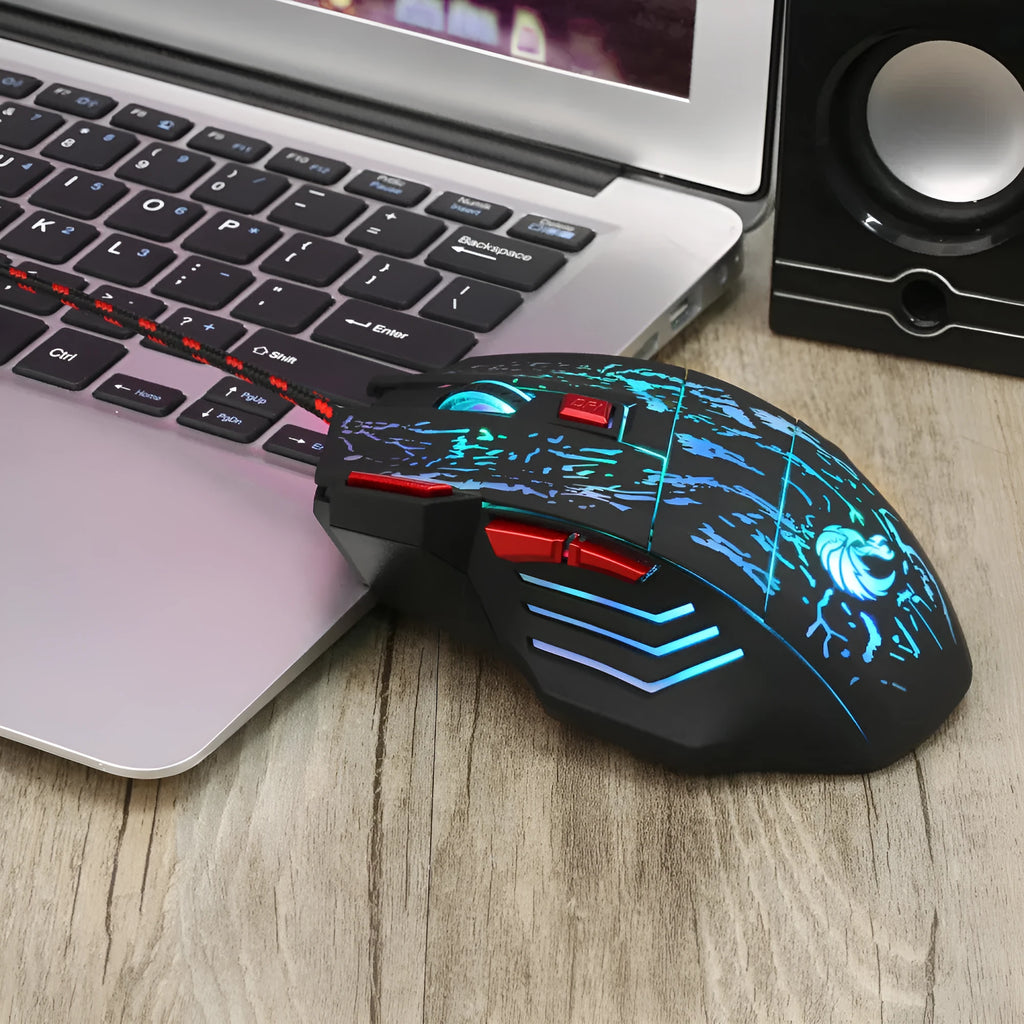 Black Water Crack pattern luminous gaming mouse with USB cable on desktop
