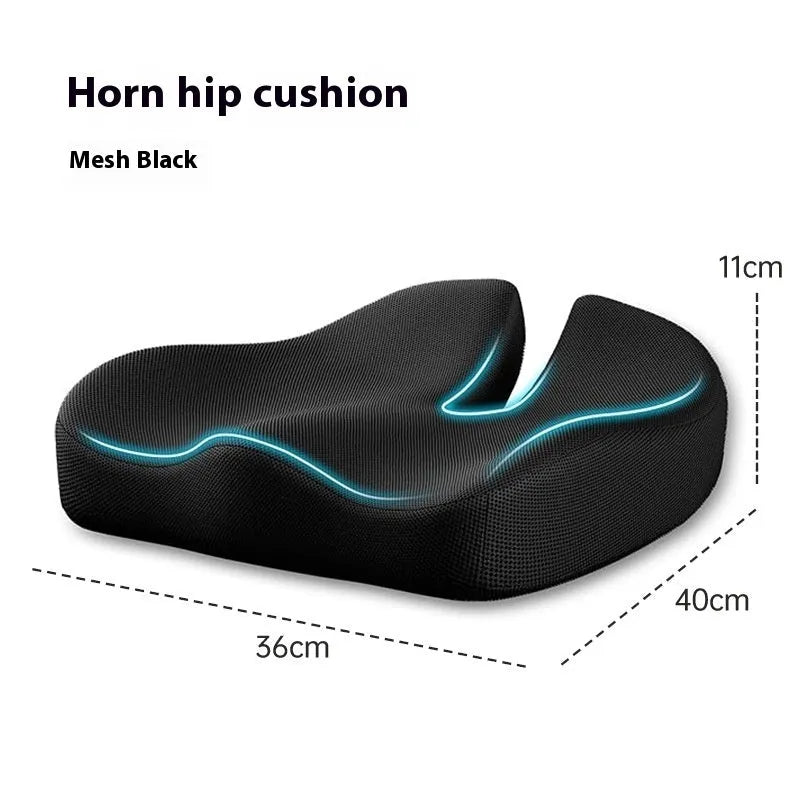 A black memory foam office chair cushion measuring 36 by 40 centimetres on a desk chair.