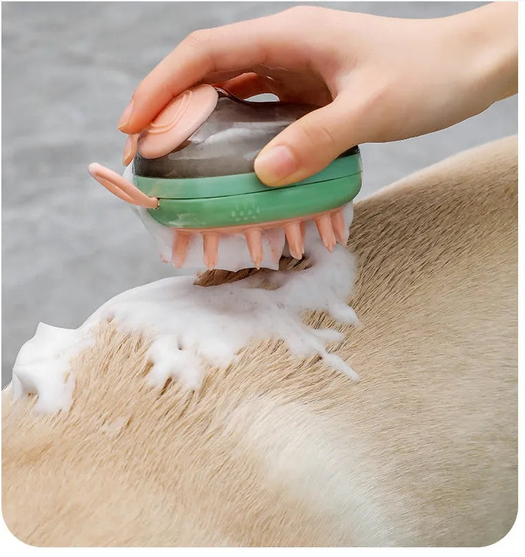 Blue pet grooming brush with soap dispenser and silicone bristles for dogs and cats