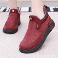Women's black casual flat ankle boots with round toe and low shaft on a white background.