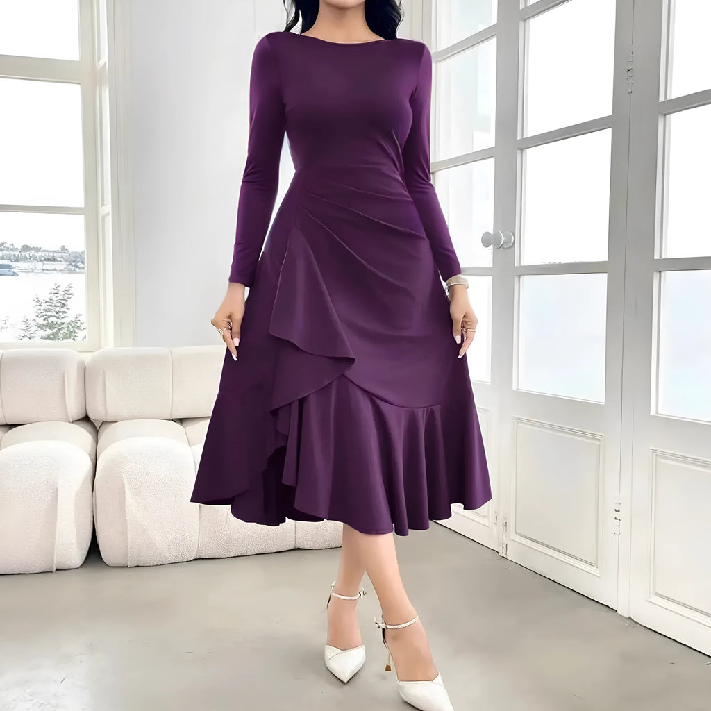 Purple women's long sleeve dress with ruffle detailing, round neck, and mid waist.