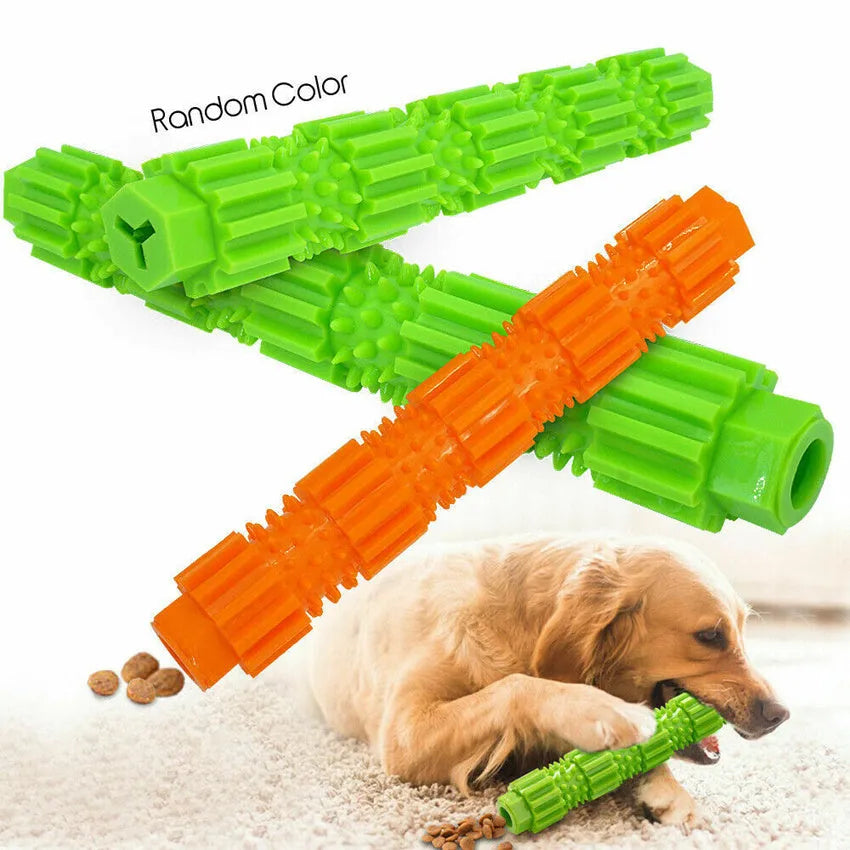Green and orange durable rubber dog chew toy with treat hole and squeaker for aggressive chewers