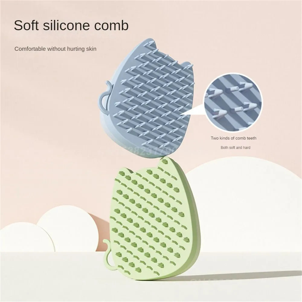 Brown sponge silicone pet hair removal brush with comb teeth on a wooden surface